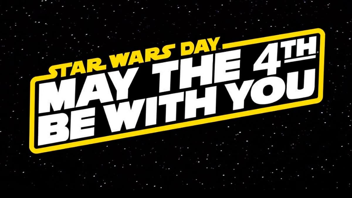 Foto de divulgação do Star Wars Day da Disney. A foto apresenta um fundo de universo com a frase "Star Wars Day. May the 4th be with you"
