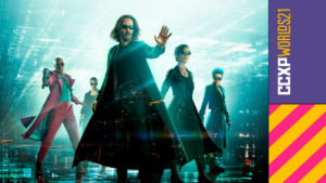 A foto apresenta uma imagem de Matrix Resurrections com um banner e logo da CCXP Worlds ao lado.