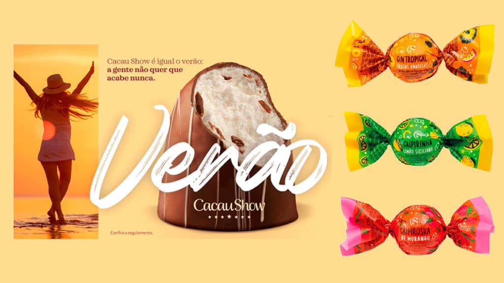 A foto apresenta o banner do Festival de Verão 2022 da Cacau Show ao lado das novas trudas de drinks alcoólicos.