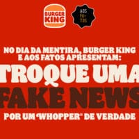 Foto com fundo vermelho acompanhada do logo do Burger King e do Aos Fatos na parte superior com a escrita "No Dia da Mentira, Burger King e Aos Fatos apresentam: Troque uma Fake News por um Whopper de verdade"