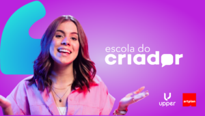 Banner da Escola do Criador com uma mulher e os logotipos da Upper e da Artplan