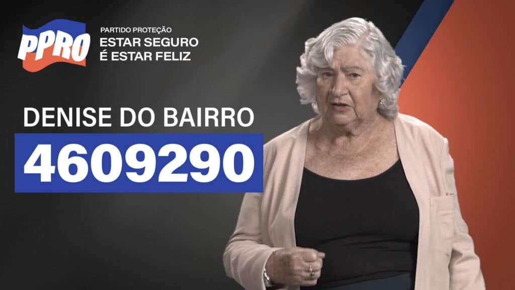 Personagem "Denise do Bairro" pede por mais iluminação nas ruas em sua campanha eleitoral antes de ser interrompida pelo anúncio da promoção do Burger King
