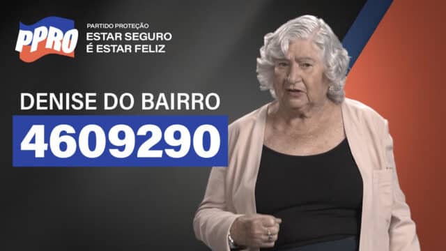 Personagem "Denise do Bairro" pede por mais iluminação nas ruas em sua campanha eleitoral antes de ser interrompida pelo anúncio da promoção do Burger King