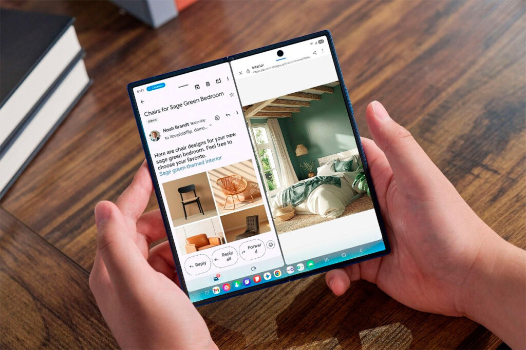 Uma pessoa segura um smartphone dobrável Galaxy Z Fold7 com a tela aberta, exibindo um e-mail e imagens de móveis em uma interface de múltiplos aplicativos.