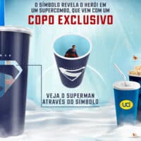 Copo temático do Superman com design que exibe o símbolo kryptoniano, acompanhado de um balde e copo de pipoca, promovendo um supercombo exclusivo da UCI.