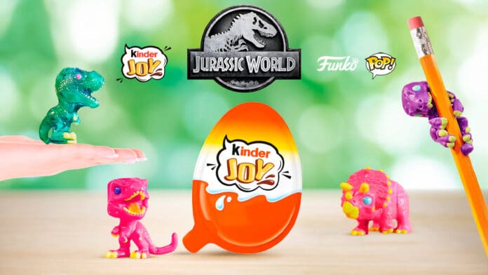 Brinde Kinder Joy da coleção Jurassic World com dinossauros no design Funko, exibindo figuras coloridas e um ovo Kinder Joy em destaque.