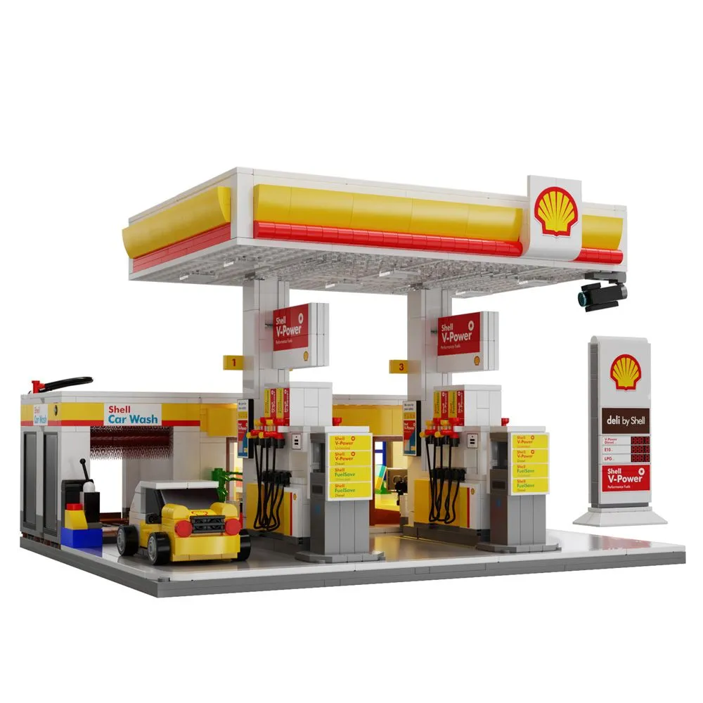 Modelo em blocos de montar de um posto de gasolina Shell com bomba V-Power, loja de conveniência e carwash, incluindo um carrinho temático.