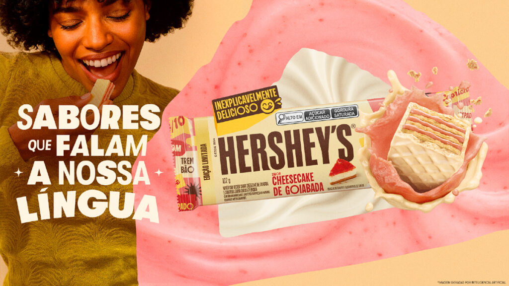 Imagem de uma mulher sorrindo enquanto experimenta um wafer da Hershey's sabor Cheesecake de Goiabada, com embalagem em destaque ao fundo e um fundo rosa vibrante com o texto 'Sabores que falam a nossa língua'.