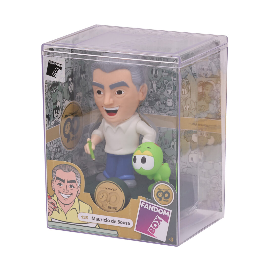 Figura de colecionável do cartunista Mauricio de Sousa com cabelo grisalho, segurando um lápis e acompanhado de Horácio, dentro de embalagem da Fandom Box, em comemoração aos seus 90 anos.