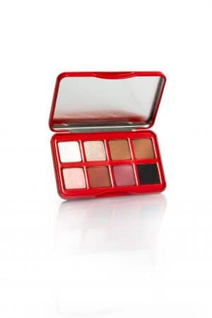 Paleta de sombras com oito tons versáteis em embalagem vermelha, com espelho na parte interna.