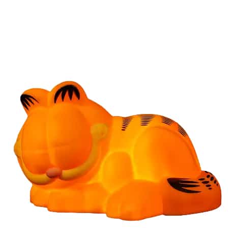 Uma estatueta de tigre laranja, macia e brilhante, repousando com os olhos fechados.