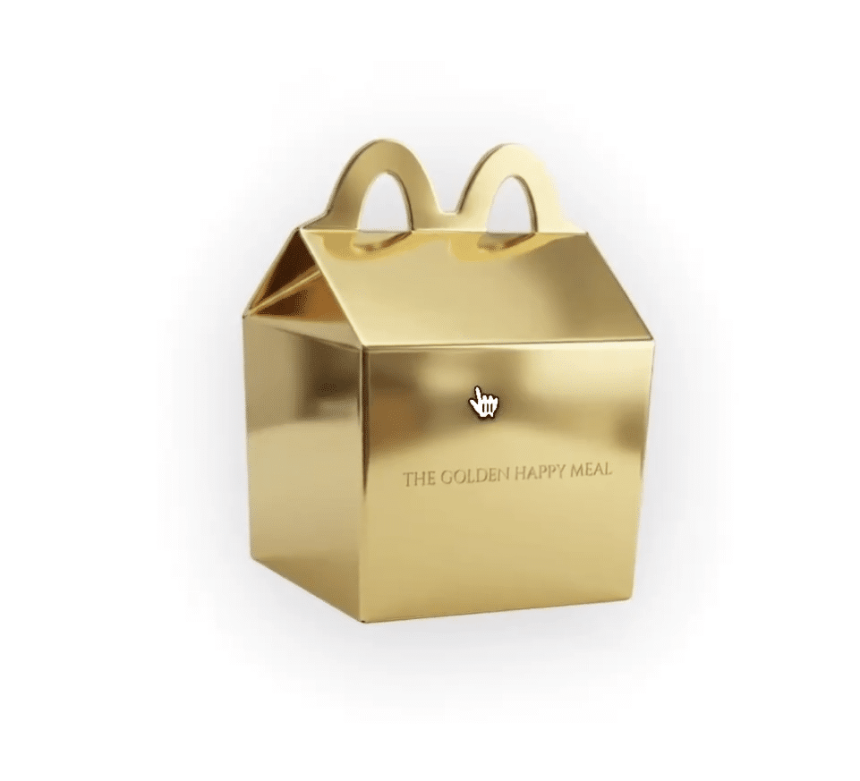 Uma caixa dourada brilhante para viagem, com design que lembra uma embalagem do McLanche Feliz, com alça e a inscrição "THE GOLDEN HAPPY MEAL" gravada na frente.