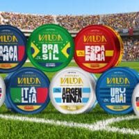 Banner Valda com latas colecionáveis das seleções da Copa: França, Brasil, Espanha, Inglaterra, Itália, Argentina, Uruguai e Alemanha.