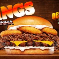 Burger King King Fraldinha com fraldinha desfiada, queijo cheddar e bacon, imagem promocional The Kings