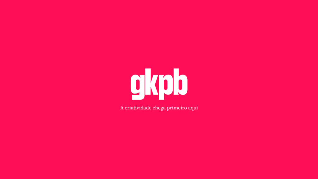 Imagem de fundo rosa com o logotipo “gkpb” e o texto “A criatividade chega primeiro aqui”.