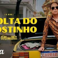 Agostinho Carrara em campanha do Canva IA 2.0, com carro amarelo e texto na arte “A VOLTA DO AGOSTINHO”
