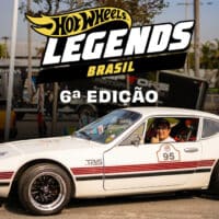 Carro customizado estilo Hot Wheels Legends Brasil em evento, com placa “Hot Wheels Legends Brasil 6ª Edição”.