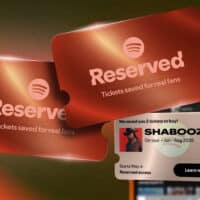 Cartões digitais “Reserved” do Spotify, com mensagem de ingressos reservados e acesso antecipado para fãs.