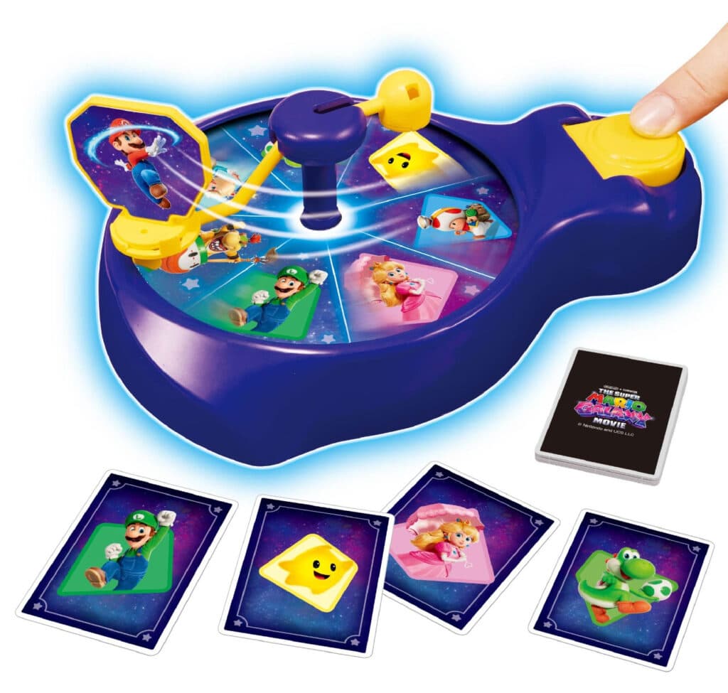 Jogo analógico Epoch Magia inspirado em Super Mario Galaxy, com cartas e personagens em cenário espacial colorido.
