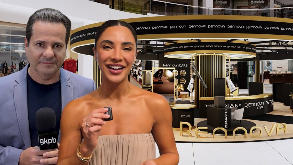 Evento de saúde estética com profissional ao lado de mulher sorridente segurando celular, em estande decorado com letreiro “Benova”.