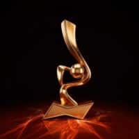 Trofíu dourado em formato de drible sobre base com faísca, remetendo ao prêmio The Dribbler da Budweiser na Copa do Mundo 2026.