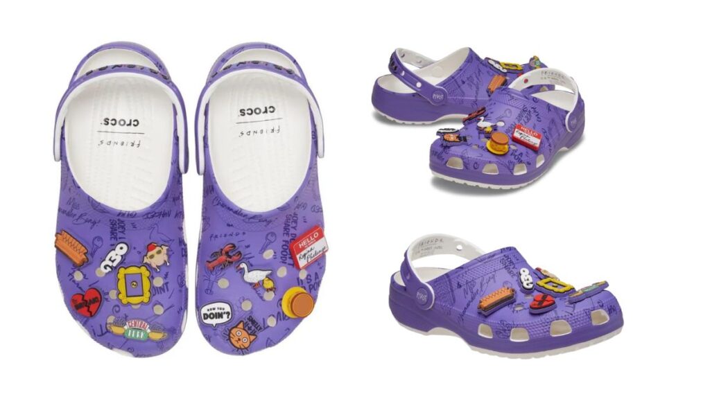 Tênis Crocs Classic Clog roxo com tema Friends, estampas de personagens e detalhes coloridos, vista frontal e lateral