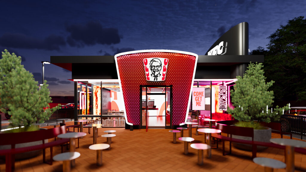Fachada do KFC com letreiro do balde e área externa com mesas e cadeiras ao entardecer, no rebranding da marca.