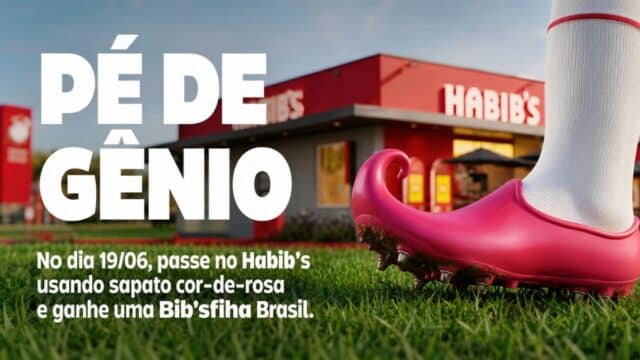 Chuteira cor-de-rosa do Habib’s sobre grama com fachada da loja ao fundo e texto promocional em destaque.