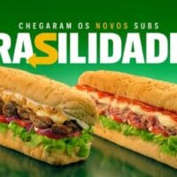 Imagem promocional do Subway Brasilidades com dois sanduíches ao fundo verde e o texto “BRASILIDADES”.