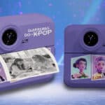 Duas câmeras digitais Candide “Guerreiras do K-Pop” em roxo, mostrando fotos impressas e cenas da animação.