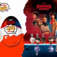 Embalagem do Kinder Joy edição Stranger Things com personagens e miniaturas em fundo vermelho e azul