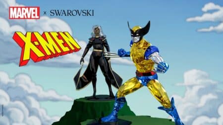 X-Men Marvel e Swarovski: estatuetas com Wolverine Estatuetas dos X-Men em parceria Marvel e Swarovski, com Wolverine e um personagem ao lado em plataforma verde.