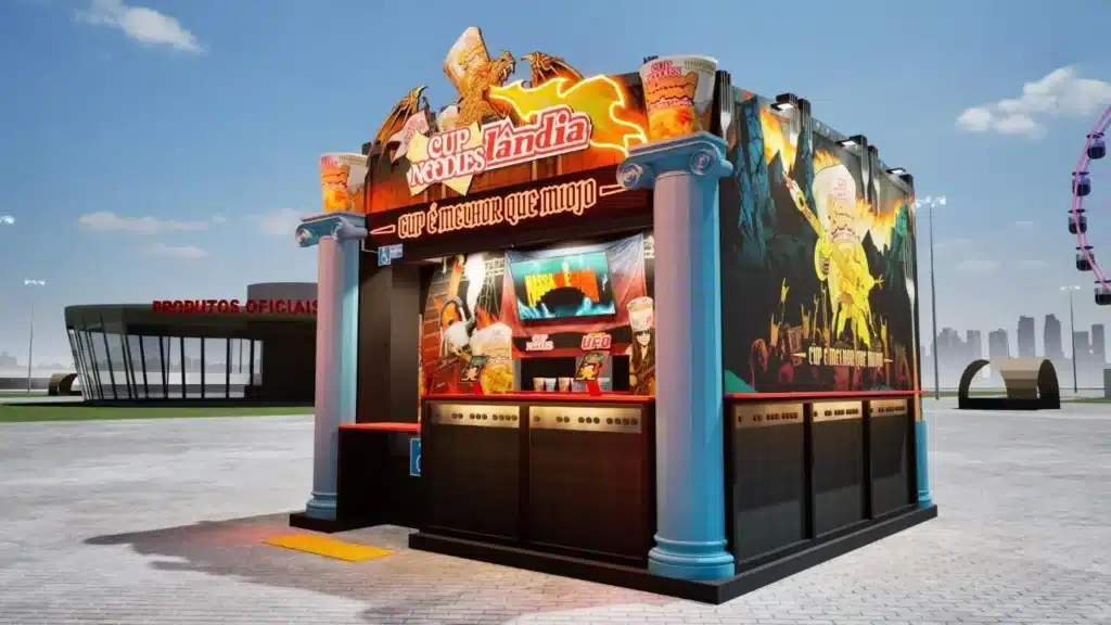 Estande temático de marcas na Cidade do Rock, com brinquedos e estrutura colorida para o Rock in Rio 2026.