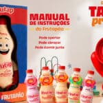 Embalagem de leite fermentado Frutapão com promoção Tampa Premiada e tampa premiada vermelha ao lado dos produtos.