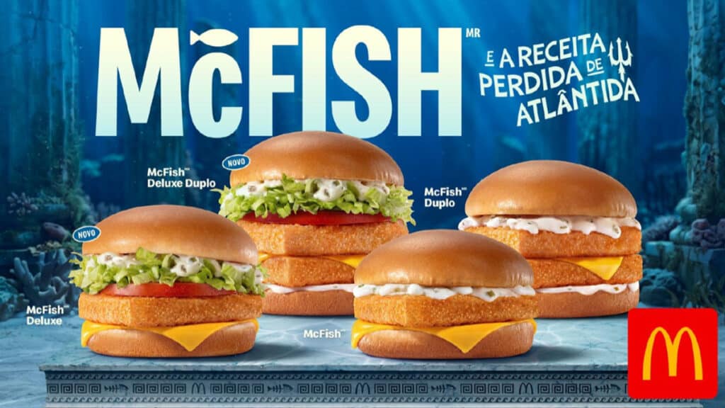 McFish Deluxe 2026 Atlântida (McDonald’s) Imagem promocional do McFish Deluxe 2026 com sanduíches de peixe e o logo do McDonald's, tema “Atlântida”