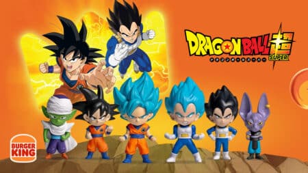 Coleção Dragon Ball Super no Burger King com figuras dos personagens Figuras colecionáveis Dragon Ball Super no Burger King, com personagens em poses de combate no fundo laranja