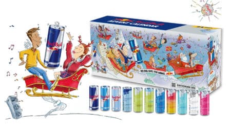 Calendário do advento Red Bull com 24 latas Imagem do calendário do advento Red Bull com caixa, ilustrações festivas e 24 latas variadas