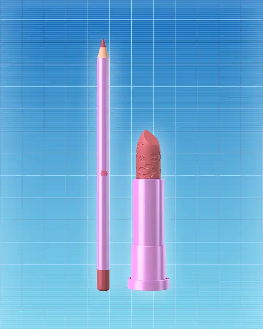 Batons rosa e nude da linha de maquiagens das Três Espiãs Demais da Martine Cosmetics sobre fundo azul quadriculado.