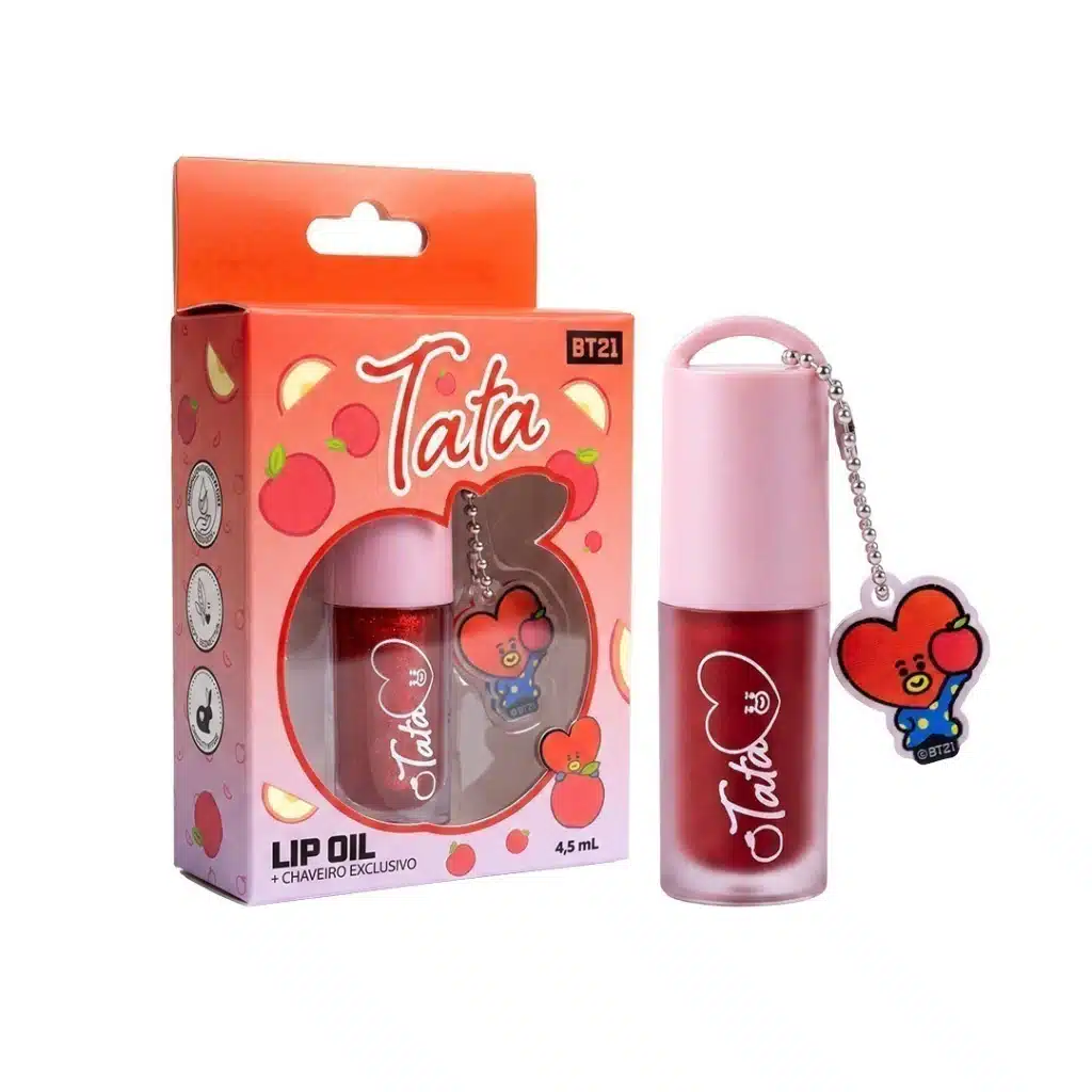 Kit BT21 TATA com Lip Oil rosa de 4,5 ml e charm colecionável, em embalagem com ilustração do personagem