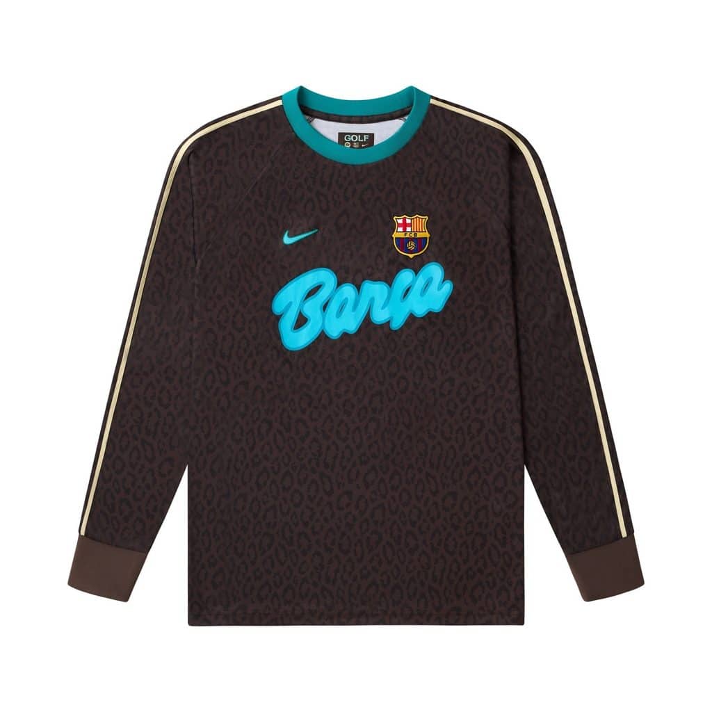 Camisa do Barcelona preta com faixa dourada, logo do clube e inscrição azul “Barça”