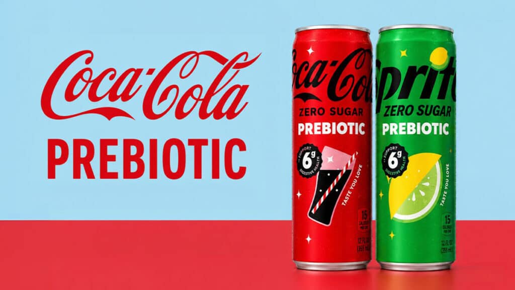 Coca-Cola Prebiotic e Sprite Zero Sugar Prebiotic Latas da Coca-Cola Zero Sugar Prebiotic e Sprite Zero Sugar Prebiotic com texto “Coca-Cola Prebiotic”.