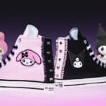 Tênis Converse da coleção temática My Melody e Kuromi, com detalhes e personagens estilizados na lateral, fundo roxo