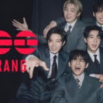 Imagem promocional do BTS com foto dos integrantes e o texto Arirang em destaque, em fundo escuro.