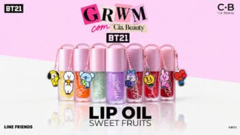 Cia Beauty BT21 Lip Oil Sweet Fruits com charms colecionáveis Cia Beauty BT21 Lip Oil Sweet Fruits com frascos rosa, roxos e charms colecionáveis ao fundo rosa