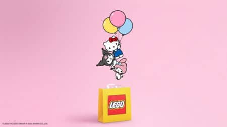 LEGO x Hello Kitty: personagens e bloco LEGO em fundo rosa Ilustração com personagens Hello Kitty e amigos sobre bloco LEGO amarelo em fundo rosa, com balões coloridos no topo.