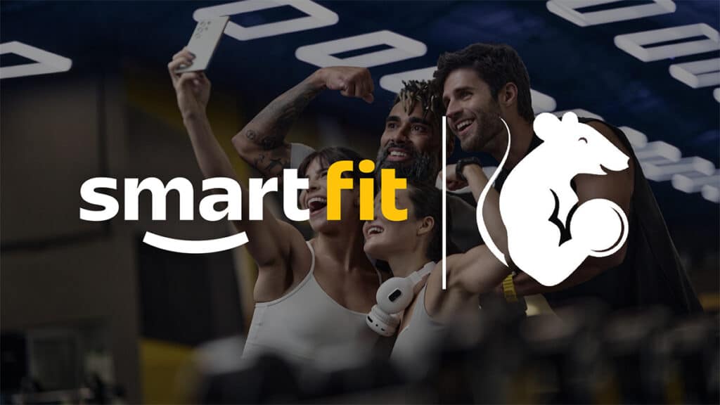 Imagem com o logo Smart Fit e um ícone de halter com um atleta em academia ao fundo.